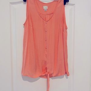 Sleeveless blouse, tie front.